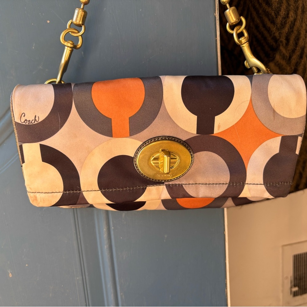 Coach Orange and Black Patterned Clutch